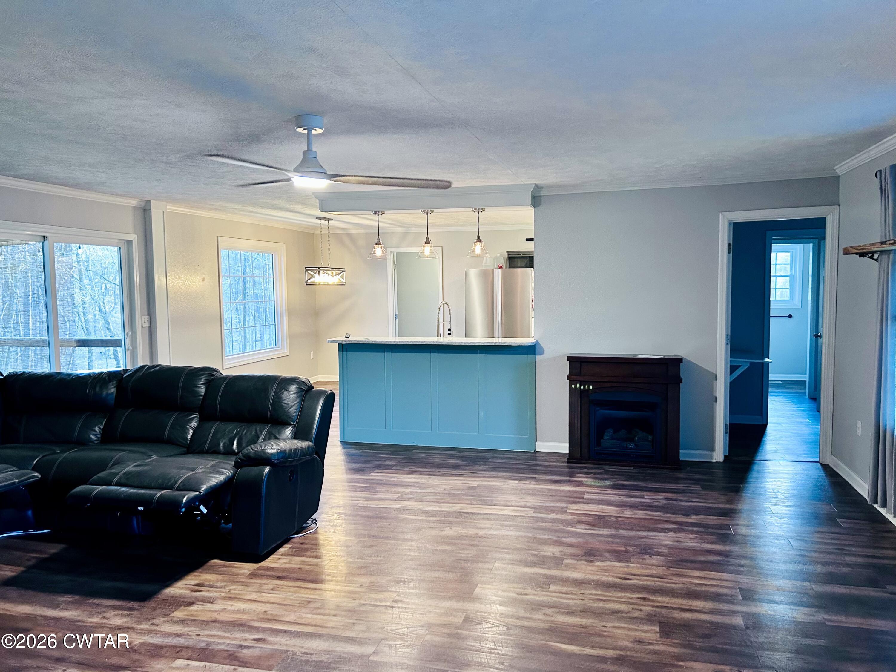 1051 McCaney Mill Road Huron, TN 38345 - Photo 3 of 23 Living Room looking into Master