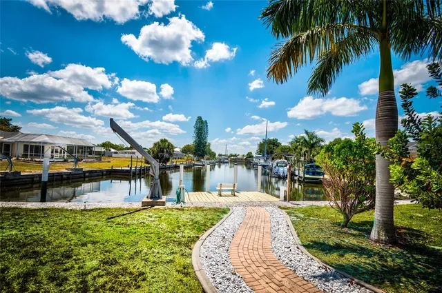 a view of a swimming pool with a garden