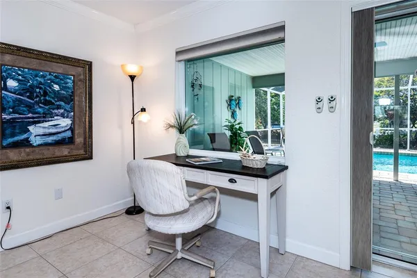 a view of a livingroom with furniture and window
