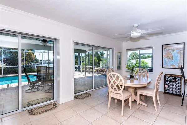 a dining room with furniture a livingroom and outdoor view