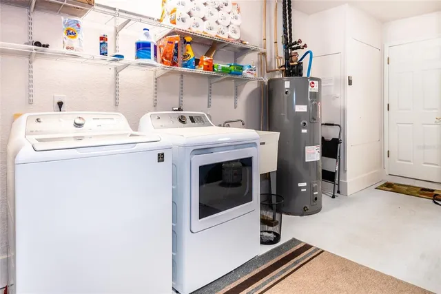 a utility room with dryer and washer