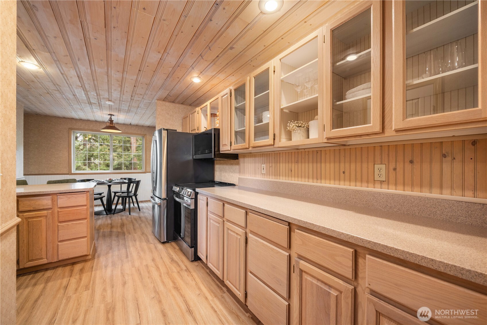 6545 Forest Ridge Drive Wenatchee, WA 98801 - Photo 14 of 40 a kitchen with stainless steel appliances granite countertop a stove and cabinets