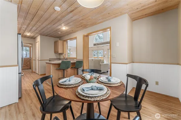 a spacious bedroom with a large bed and a window