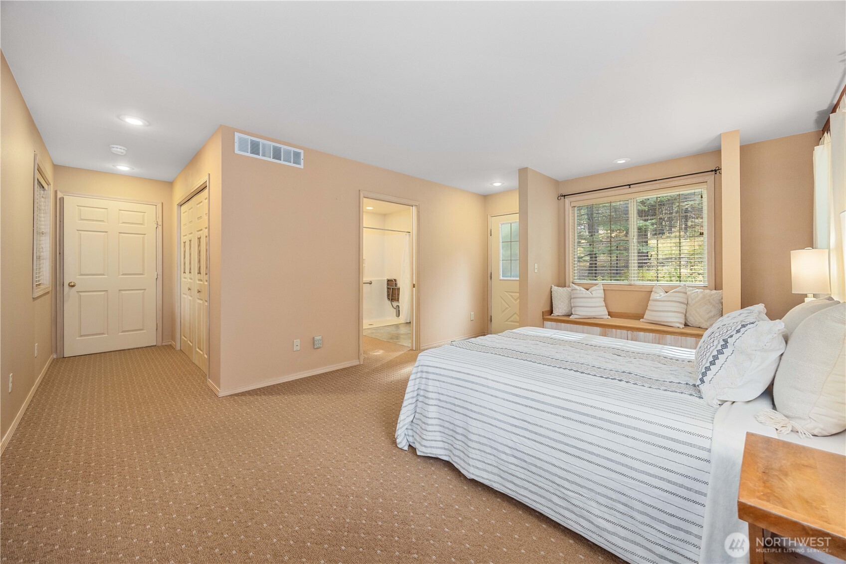 6545 Forest Ridge Drive Wenatchee, WA 98801 - Photo 15 of 40 a bedroom with a bed and a large window