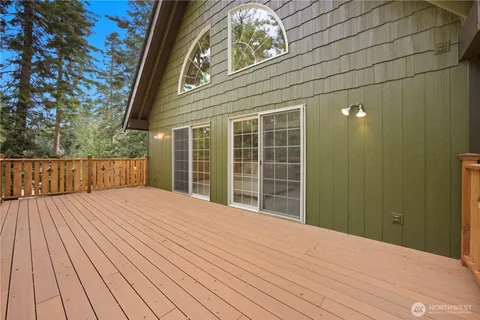 a outdoor space with wooden floor and deck