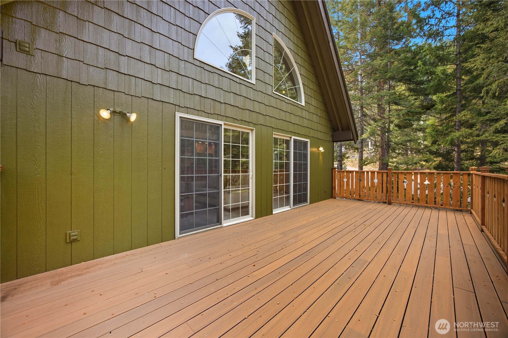 6545 Forest Ridge Drive Wenatchee, WA 98801 - Photo 34 of 40 a view of backyard with a deck and wooden floor