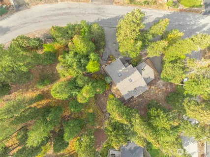 a aerial view of residential house with an outdoor space