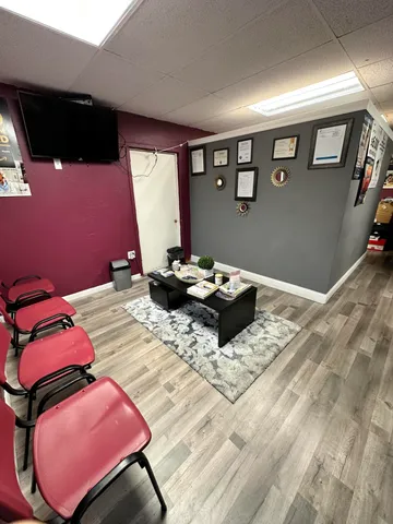 a view of a dining room with furniture