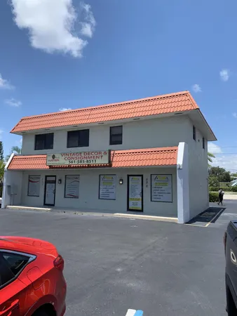 a front view of a house with a garage
