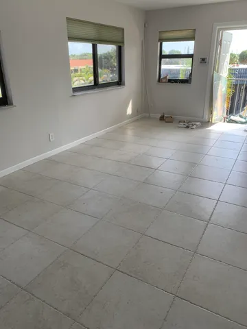 a kitchen with stainless steel appliances a refrigerator and a sink