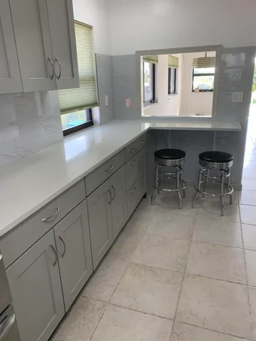 a view of a bathroom with a sink and a toilet