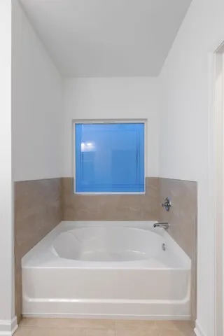 a bathroom with a bathtub