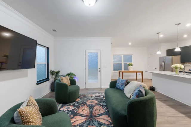 a living room with furniture and a couch