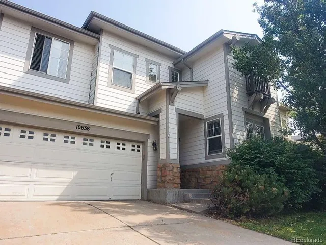 a view of a house with a street