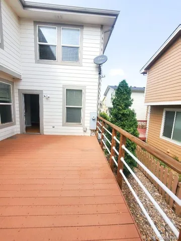 a view of an ocean with stairs and a fireplace