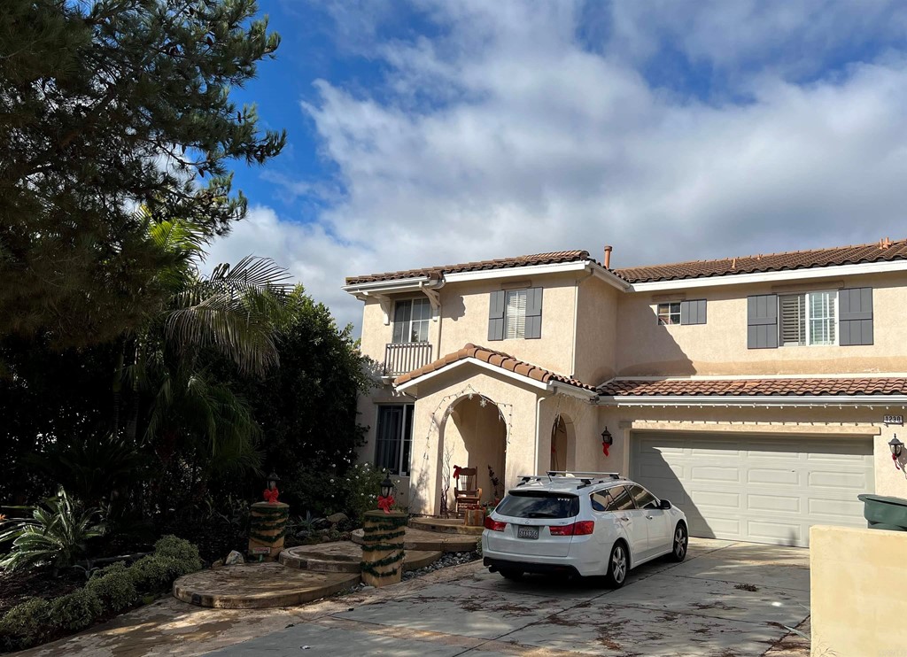 1230 Old Janal Ranch Road Chula Vista, CA 91915 - Photo 1 of 1 a car parked in front of a house