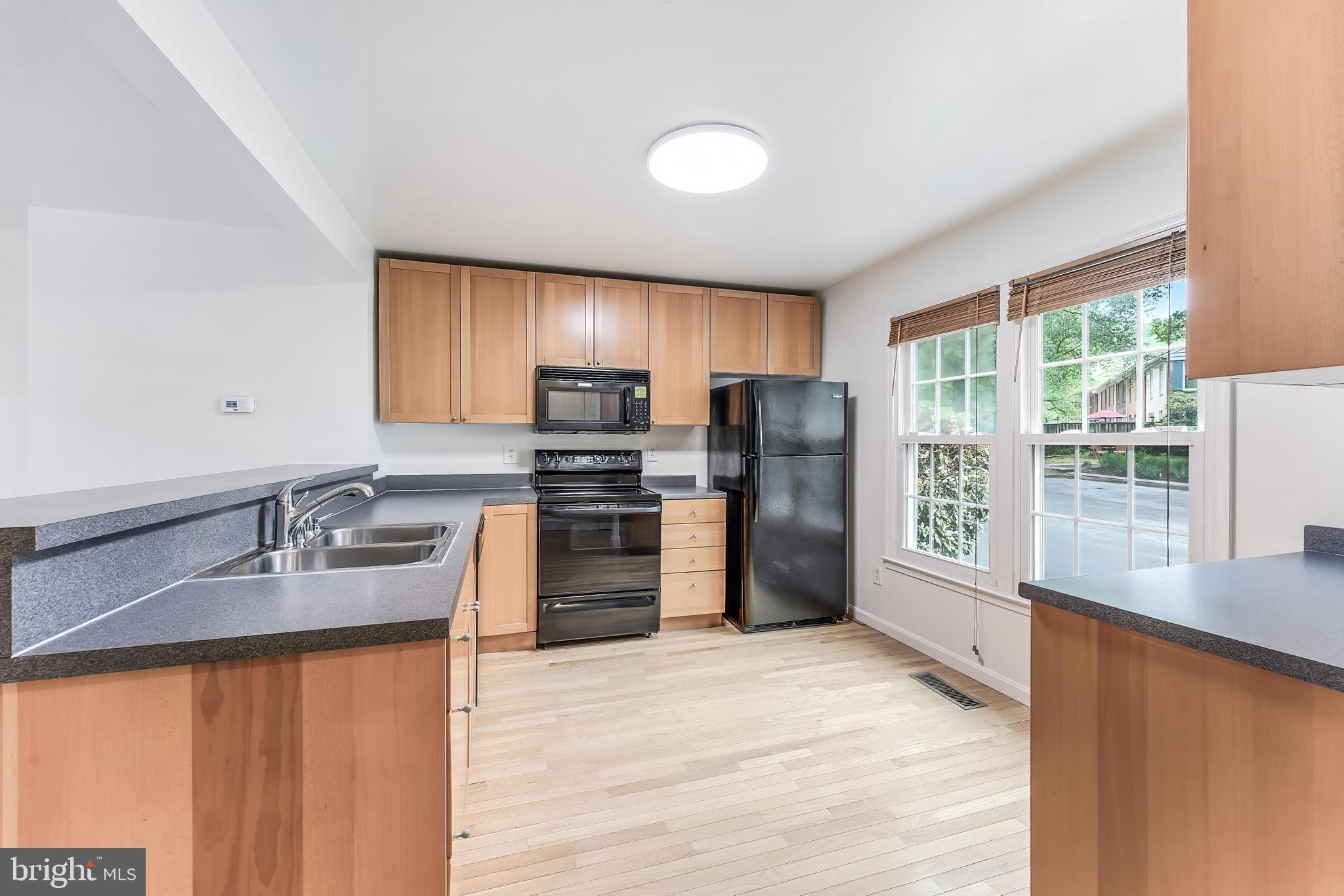 2331 Harleyford Court Reston, VA 20191 - Photo 8 of 40 Modern kitchen with natural light.