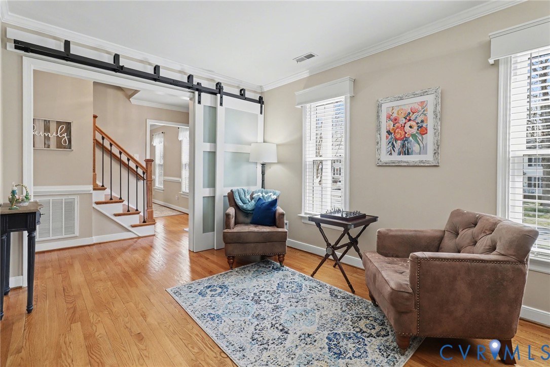 548 Glenmeadow Road Midlothian, VA 23114 - Photo 2 of 31 a living room with furniture and a rug