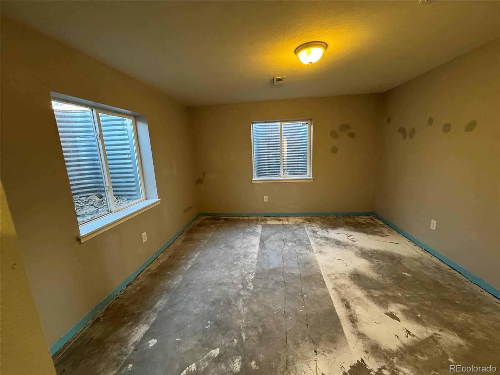 180 Deep Cut Road Livermore, CO 80536 - Photo 32 of 48 a view of an empty room with a window