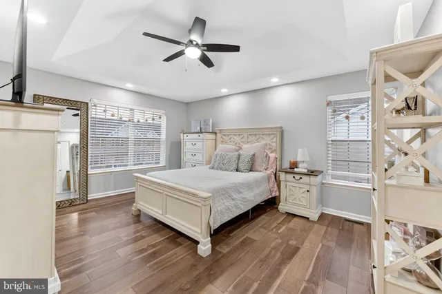 a bed room with a bed and a window