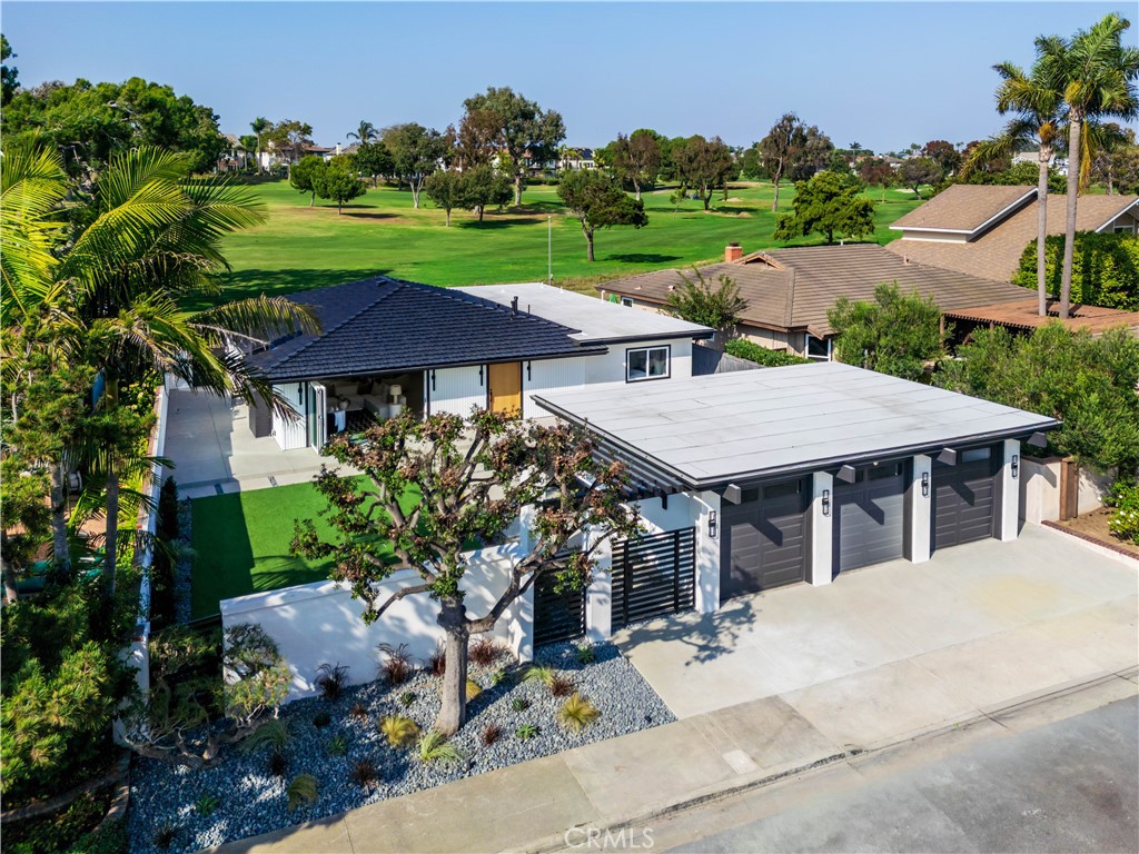 19741 Quiet Bay Lane Huntington Beach, CA 92648 - Photo 1 of 33 an aerial view of a house with yard patio and outdoor seating