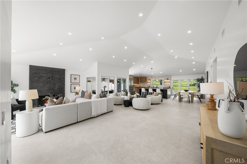 19741 Quiet Bay Lane Huntington Beach, CA 92648 - Photo 11 of 33 a living room with furniture and a table
