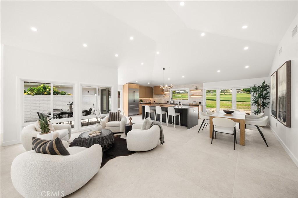19741 Quiet Bay Lane Huntington Beach, CA 92648 - Photo 15 of 33 a living room with furniture and a large window