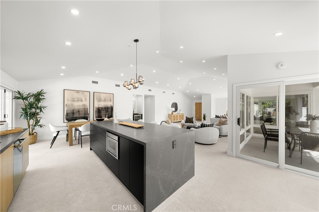 19741 Quiet Bay Lane Huntington Beach, CA 92648 - Photo 18 of 33 a view of a living room and kitchen area