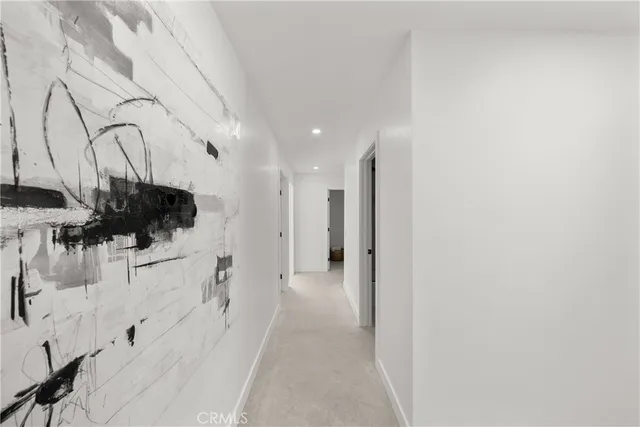 a bathroom with a double vanity sink mirror double shower and a mirror