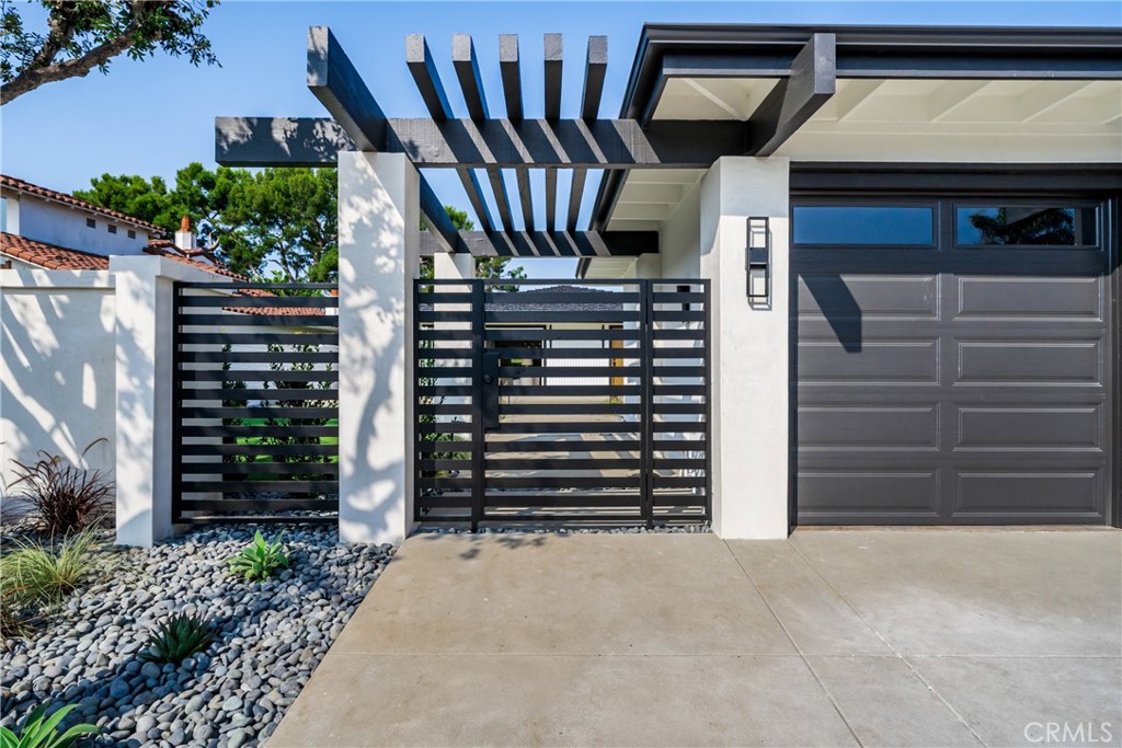 19741 Quiet Bay Lane Huntington Beach, CA 92648 - Photo 7 of 33 a view of entryway in front of house