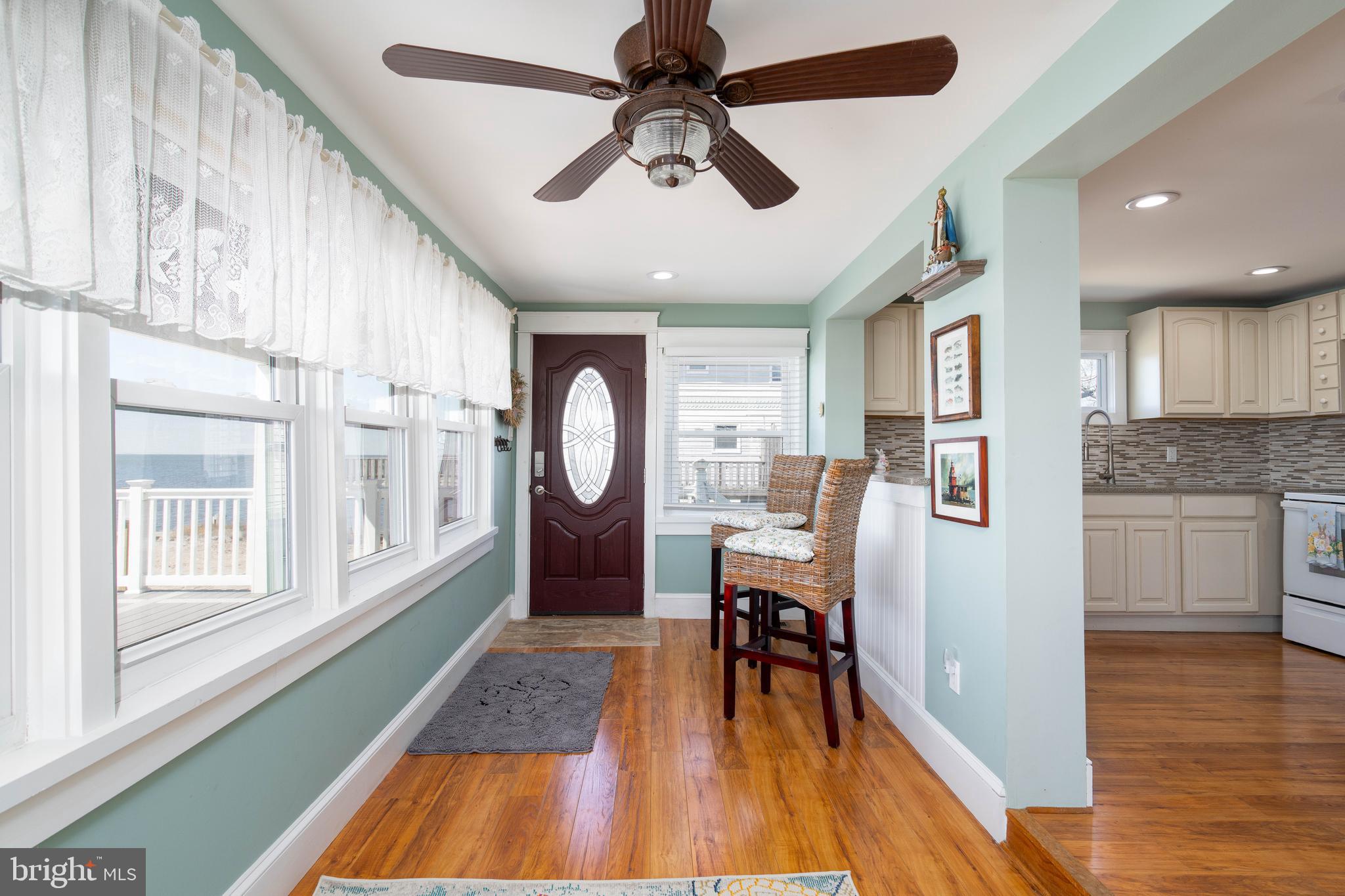 98 Delaware Avenue Fortescue, NJ 08321 - Photo 12 of 51 a living room with furniture and a large window