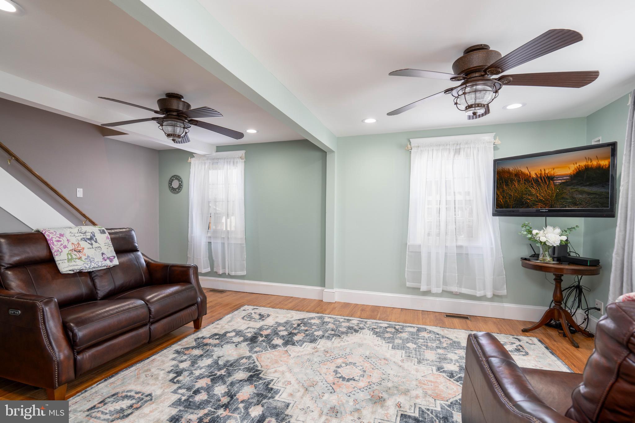 98 Delaware Avenue Fortescue, NJ 08321 - Photo 16 of 51 a living room with furniture and a flat screen tv