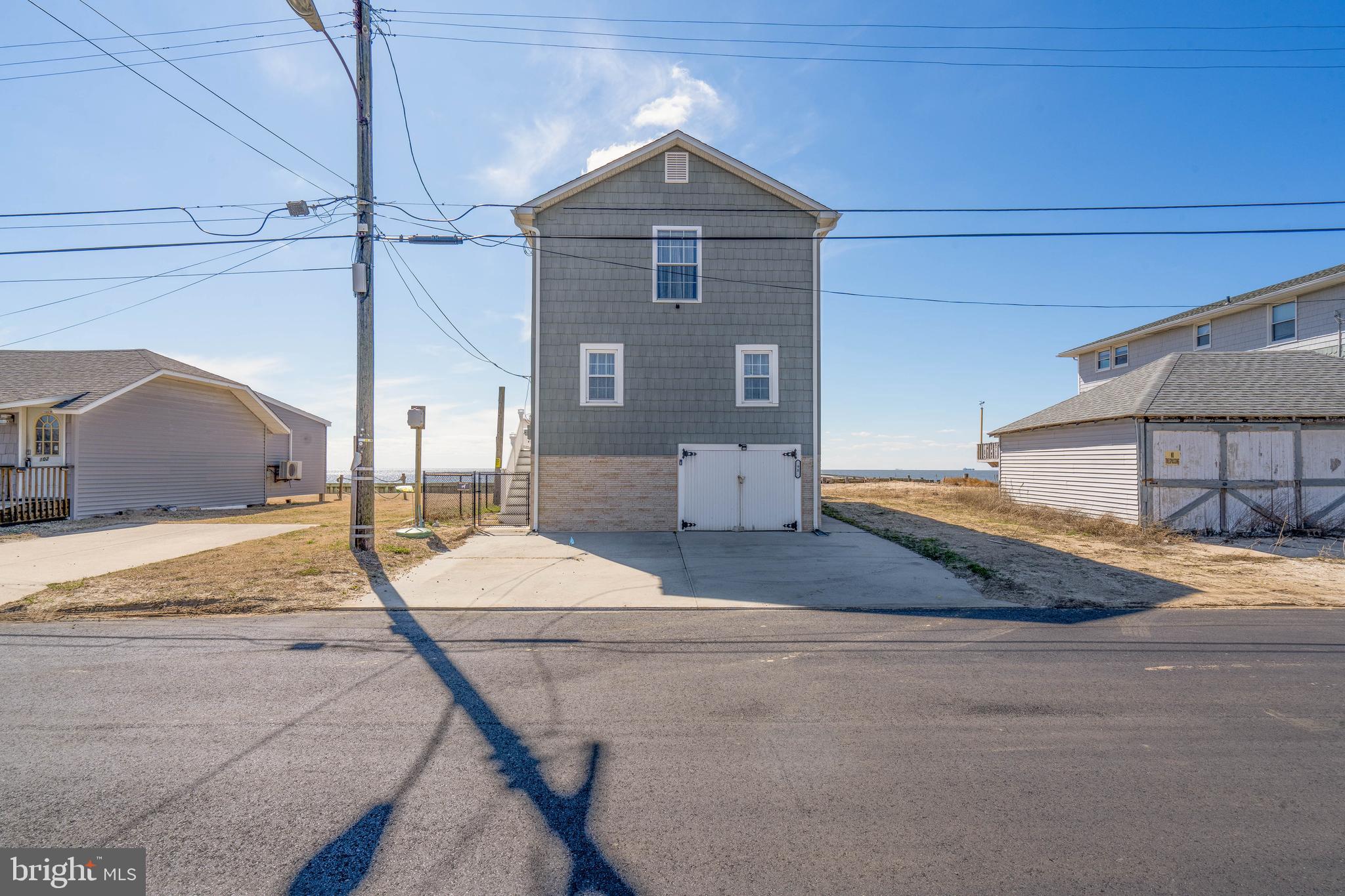 98 Delaware Avenue Fortescue, NJ 08321 - Photo 3 of 51 a spacious bathroom with a tub and sink