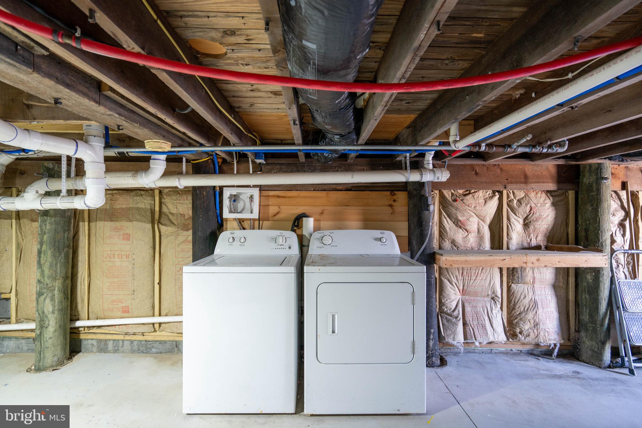 98 Delaware Avenue Fortescue, NJ 08321 - Photo 36 of 51 a utility room with dryer and washer