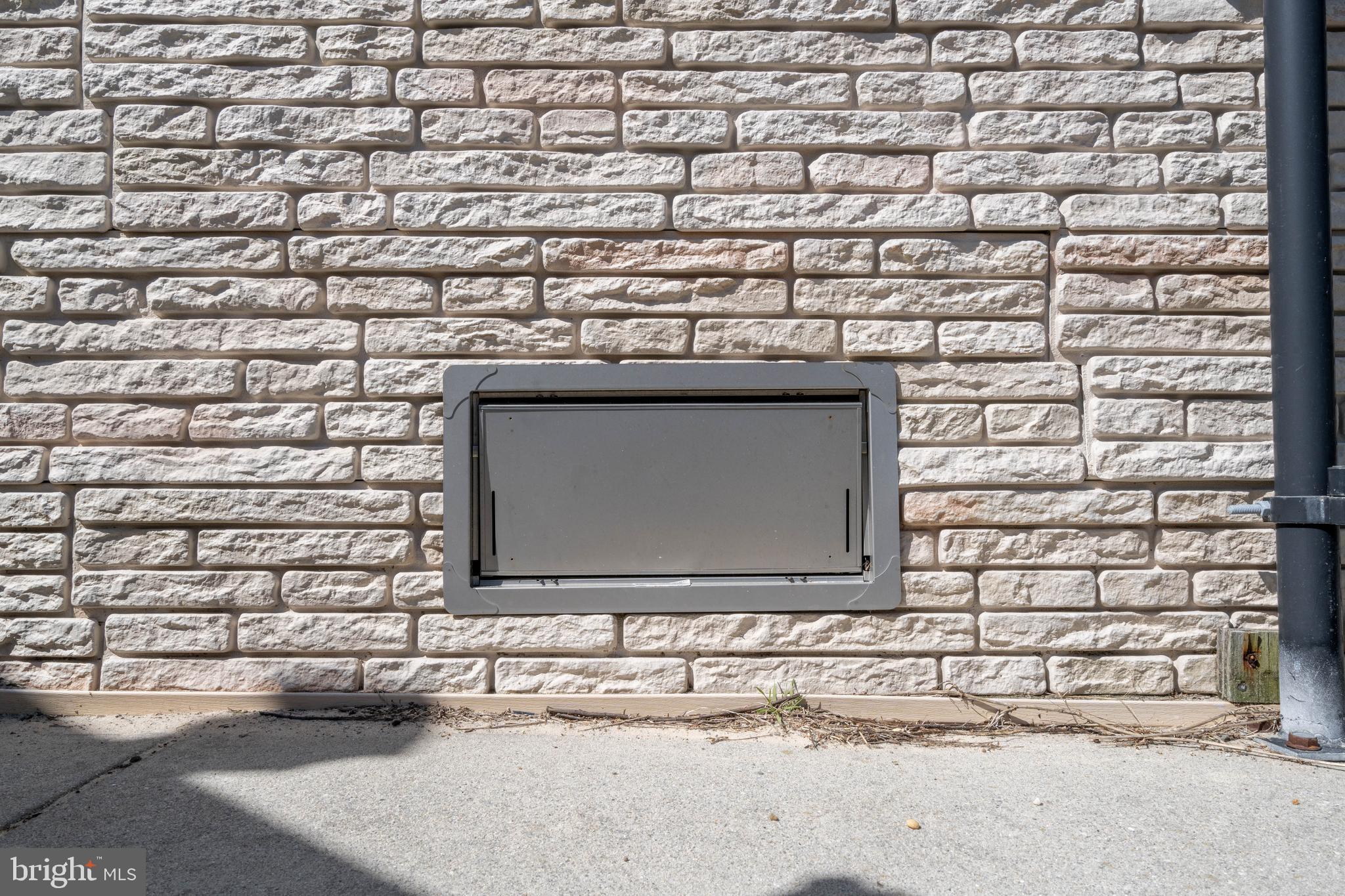 98 Delaware Avenue Fortescue, NJ 08321 - Photo 41 of 51 a fireplace with a sink