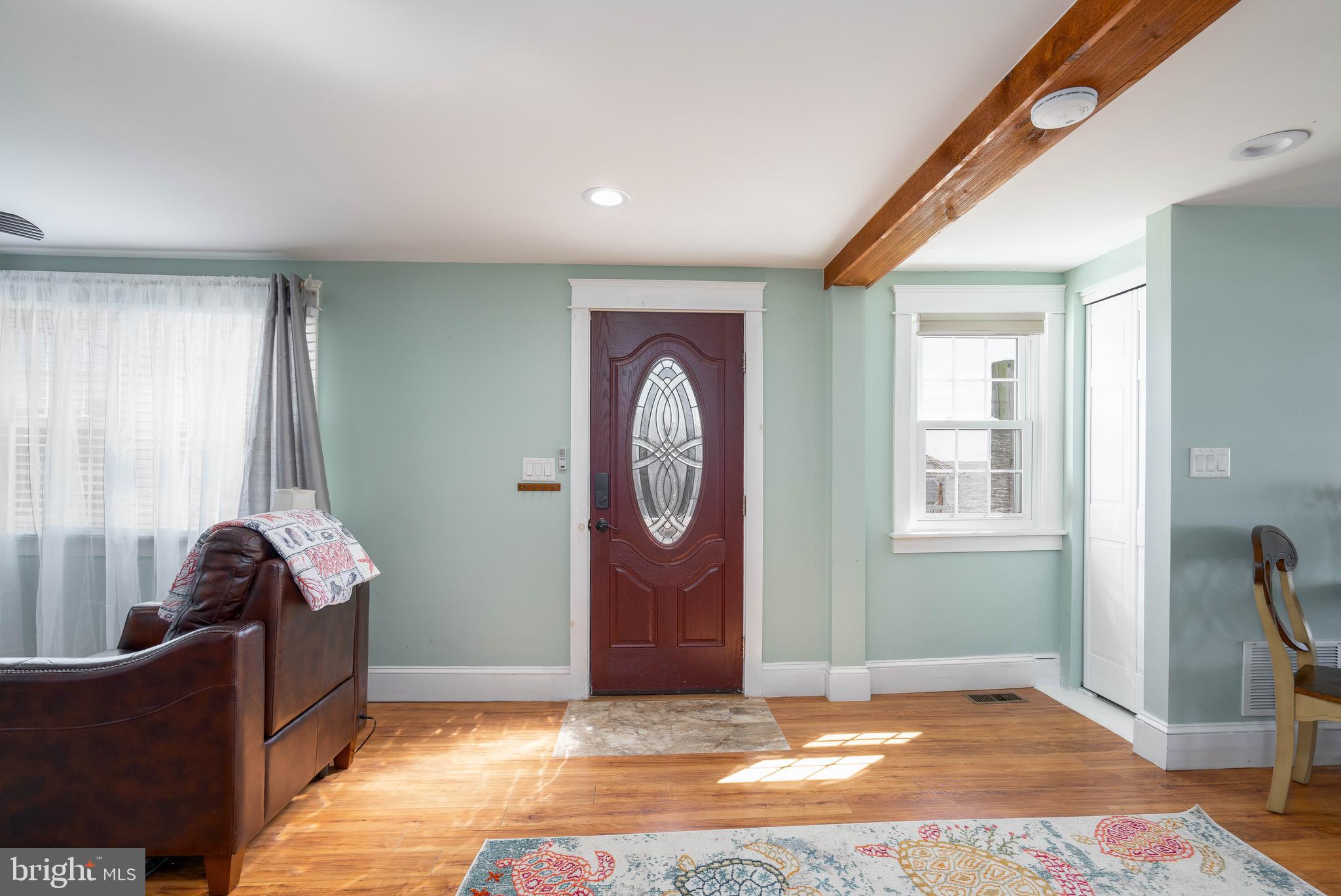 98 Delaware Avenue Fortescue, NJ 08321 - Photo 6 of 51 a living room with furniture and a window