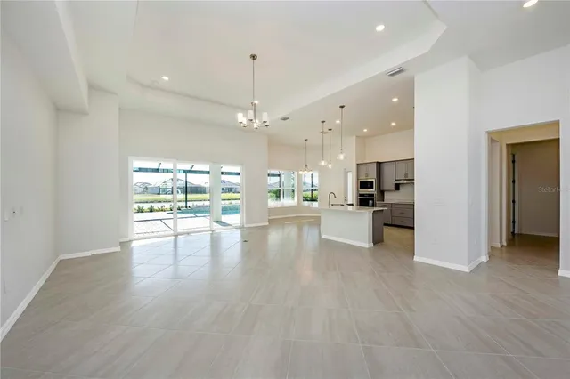 a kitchen with a stove and a refrigerator
