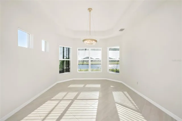 a bathroom with a sink a toilet a shower and a mirror