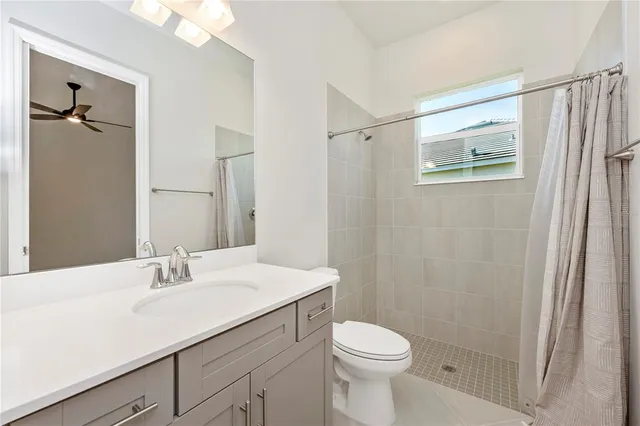a view of a house with backyard porch and sitting area