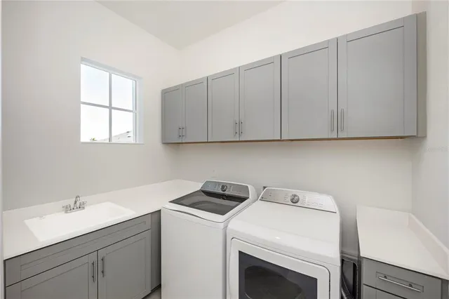 a view of a golf course with an ocean