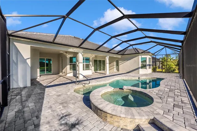 a building with car parked in front of it