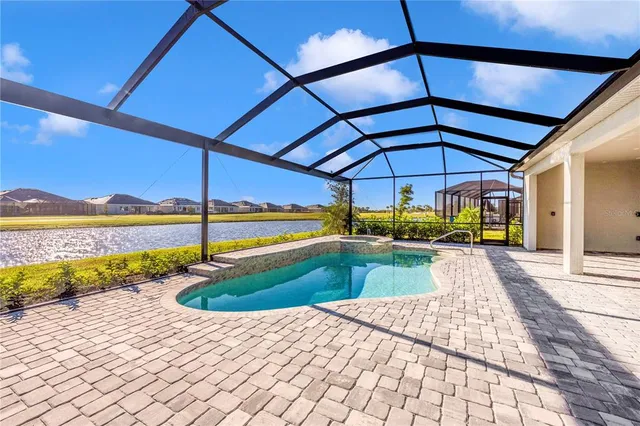 a view of a chairs and table in a patio