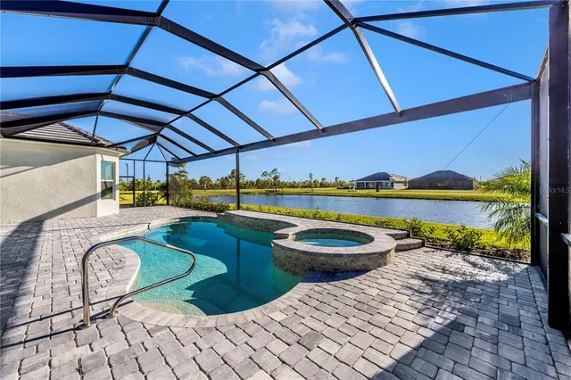 a view of a patio with couches table and chairs and potted plants