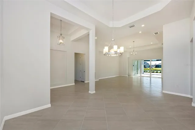 a kitchen with stainless steel appliances a refrigerator sink and microwave