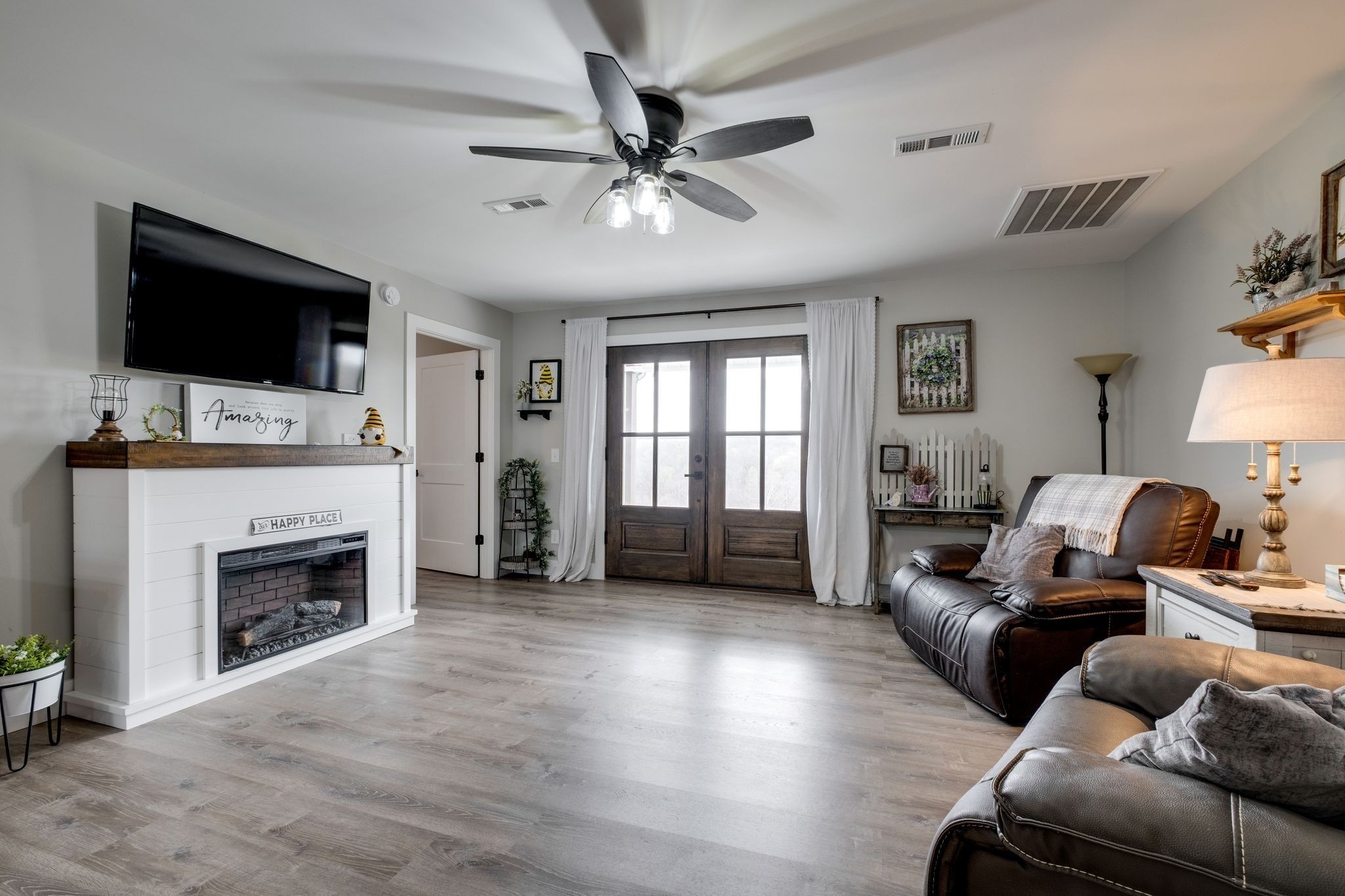 1043 Murphy Hollow Road Vanleer, TN 37181 - Photo 13 of 68 a living room with furniture and a fireplace