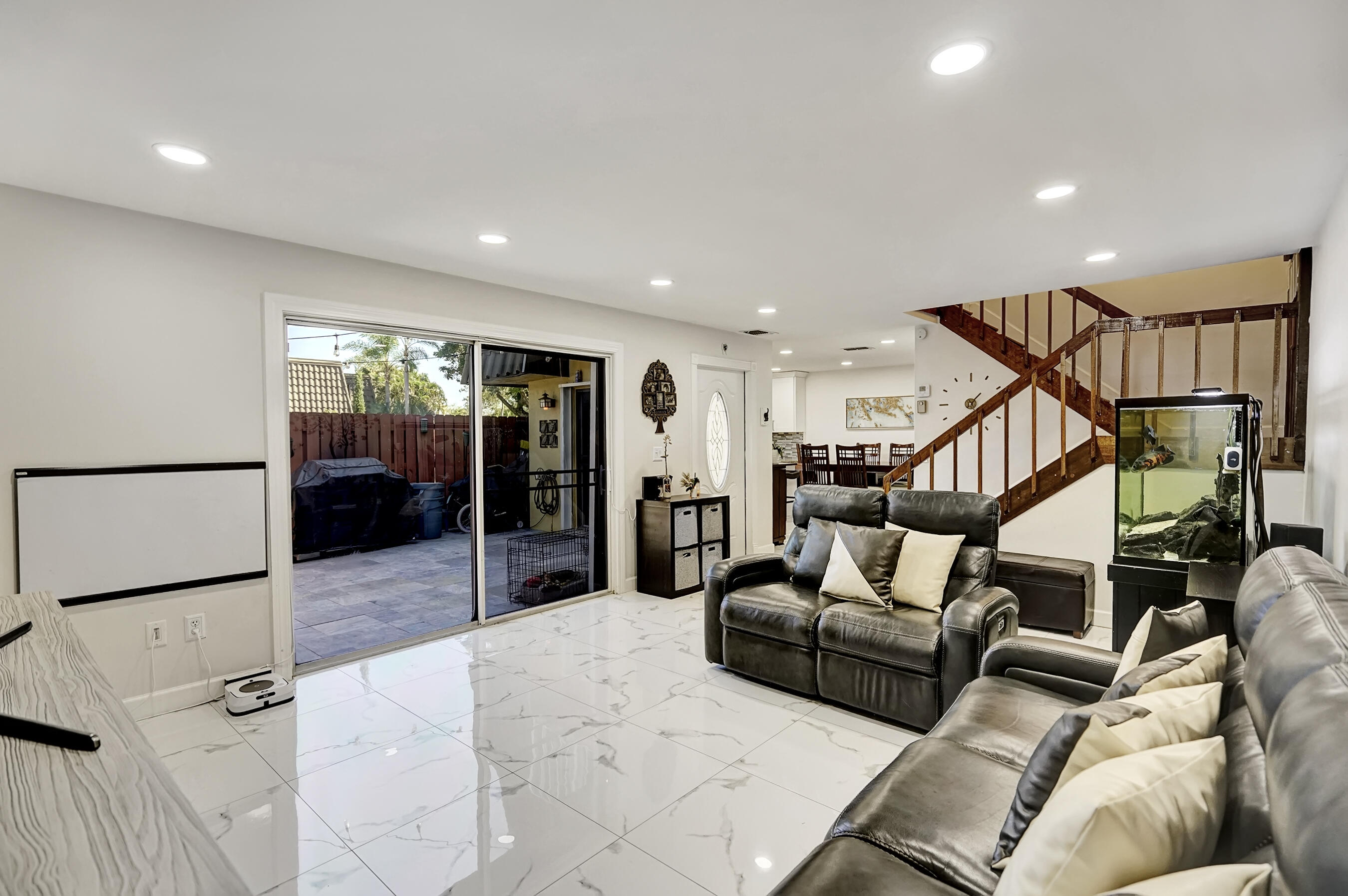 22176 Boca Rancho Drive, Unit C Boca Raton, FL 33428 - Photo 1 of 34 a living room with furniture