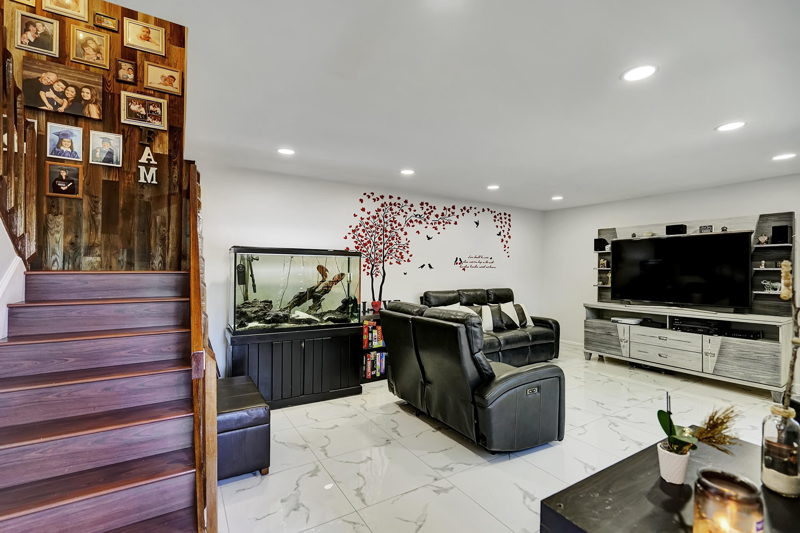 22176 Boca Rancho Drive, Unit C Boca Raton, FL 33428 - Photo 11 of 34 a living room with furniture and a flat screen tv