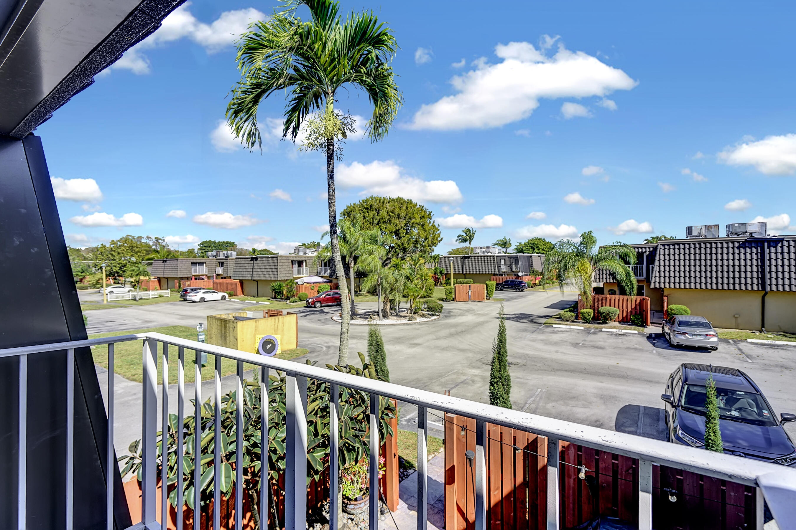 22176 Boca Rancho Drive, Unit C Boca Raton, FL 33428 - Photo 19 of 34 a view of a balcony with city view