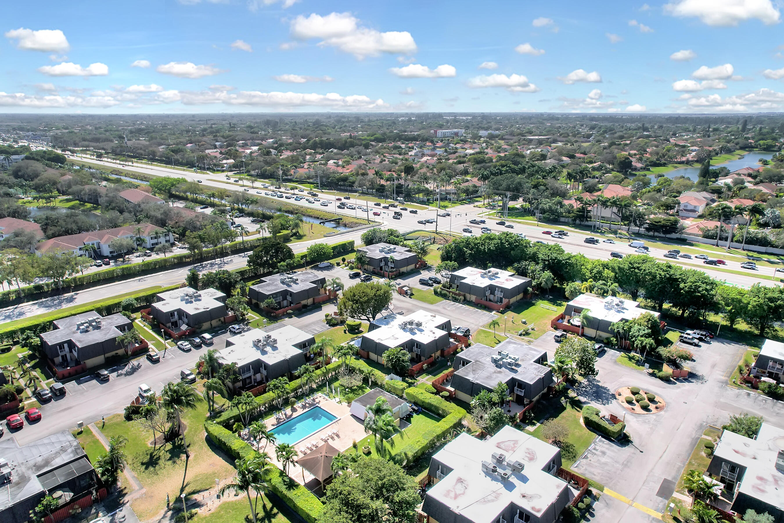 22176 Boca Rancho Drive, Unit C Boca Raton, FL 33428 - Photo 32 of 34 an aerial view of a city