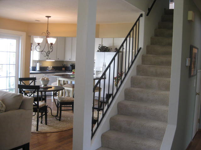 1031 Olympic Lane Seaside, CA 93955 - Photo 4 of 18 a view of a livingroom with furniture stairs and windows